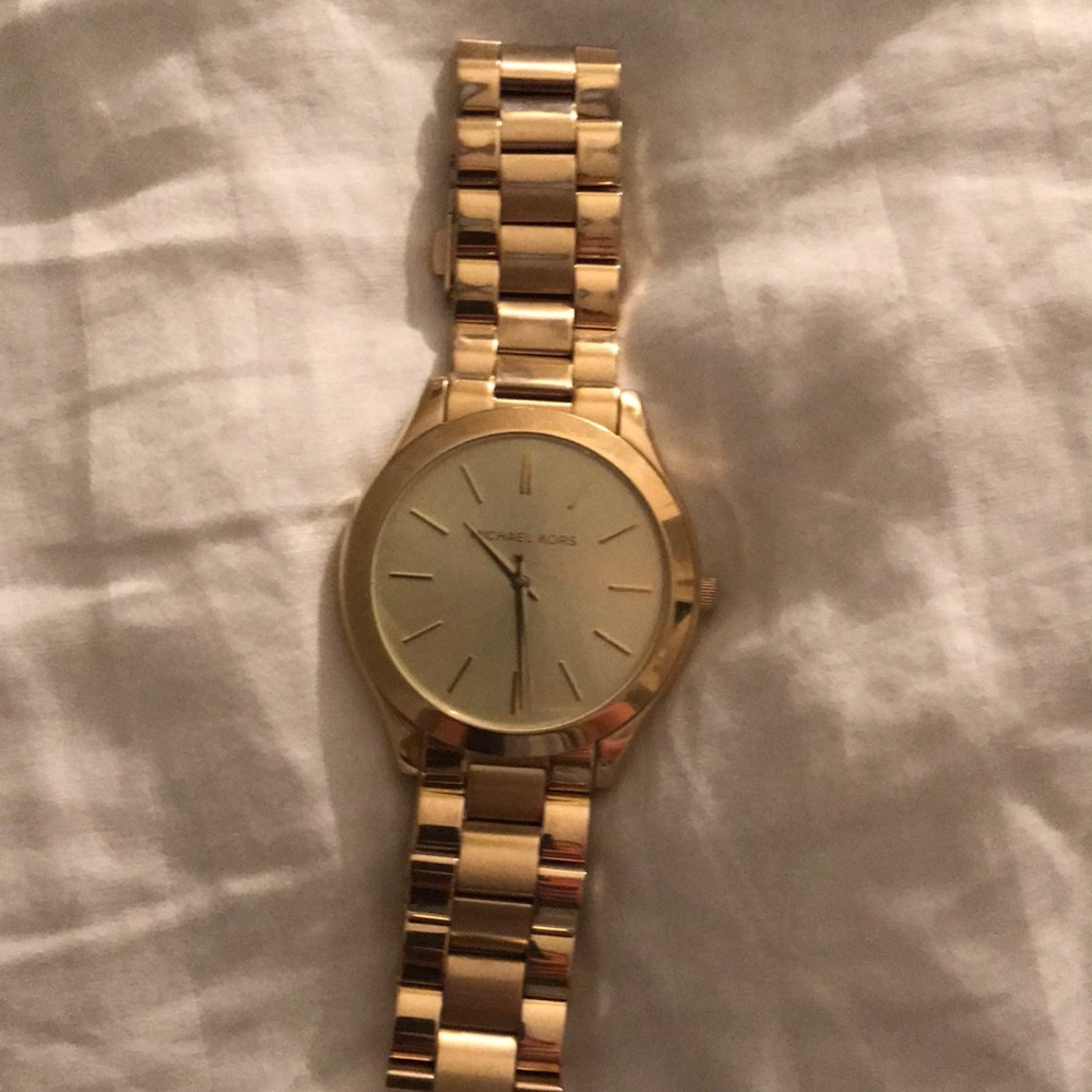 Michael Kors gold watch.